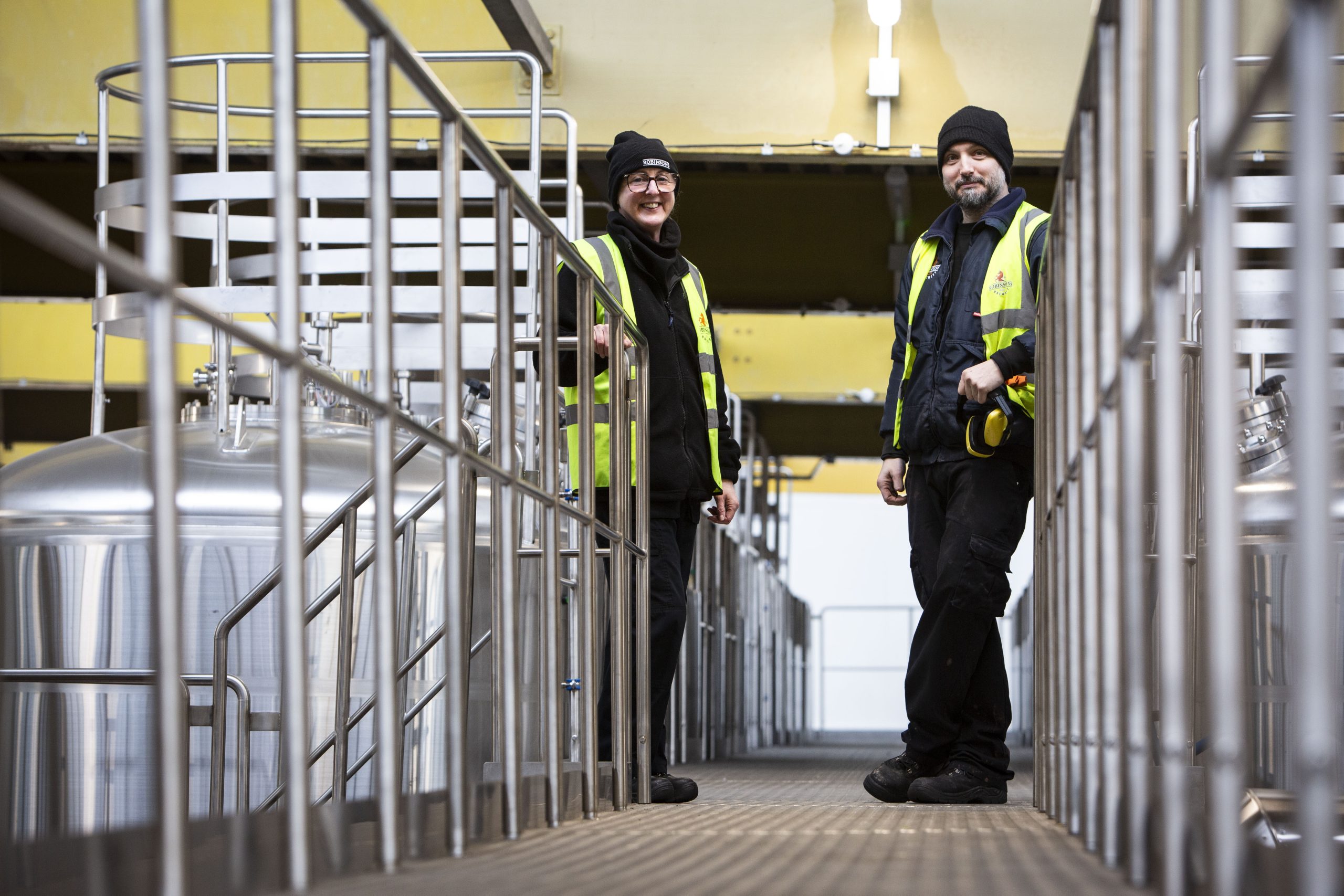 Team members in the new brewhouse