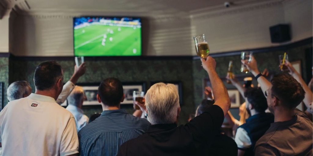 People watching the football