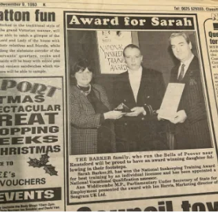 Photograph of a newspaper article about Sarah Rogers at the National Innkeeping Awards in 1993