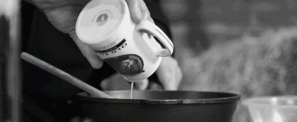 Pouring old tom into a pan